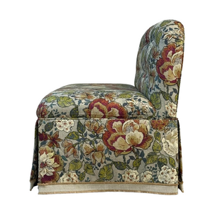 Floral patterned settee on a white background